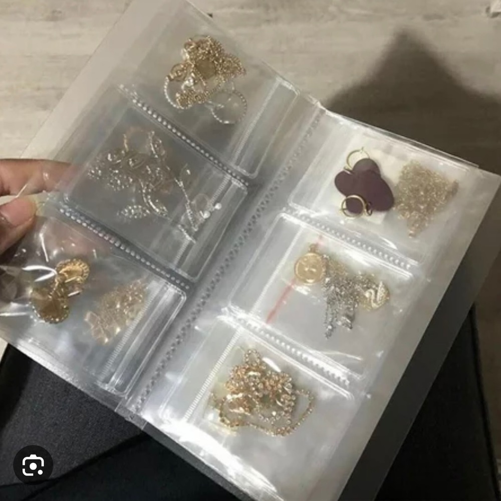 Transparent frosted jewelry storage booklets NEW & USED.